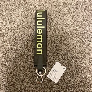 Green Lululemon Neverlost keychain